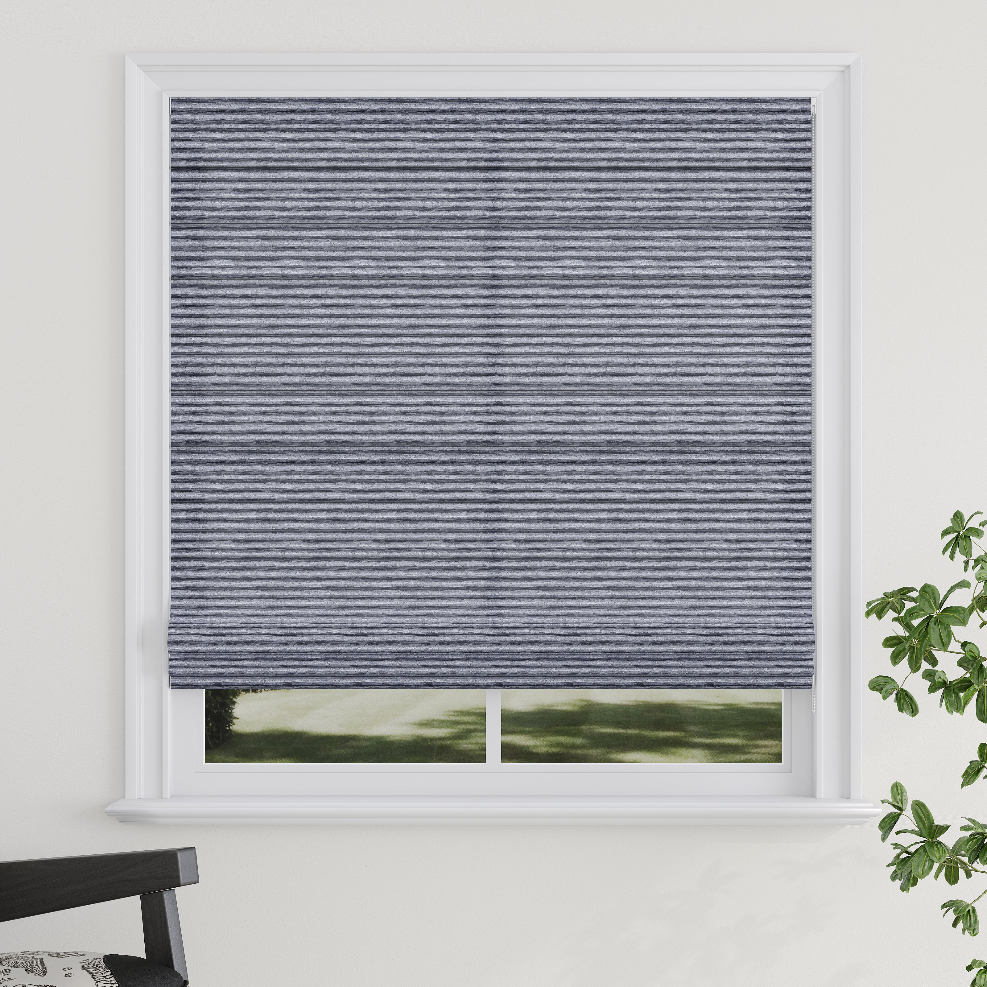 Modern beige fabric roller blind installed on a window with soft lighting.