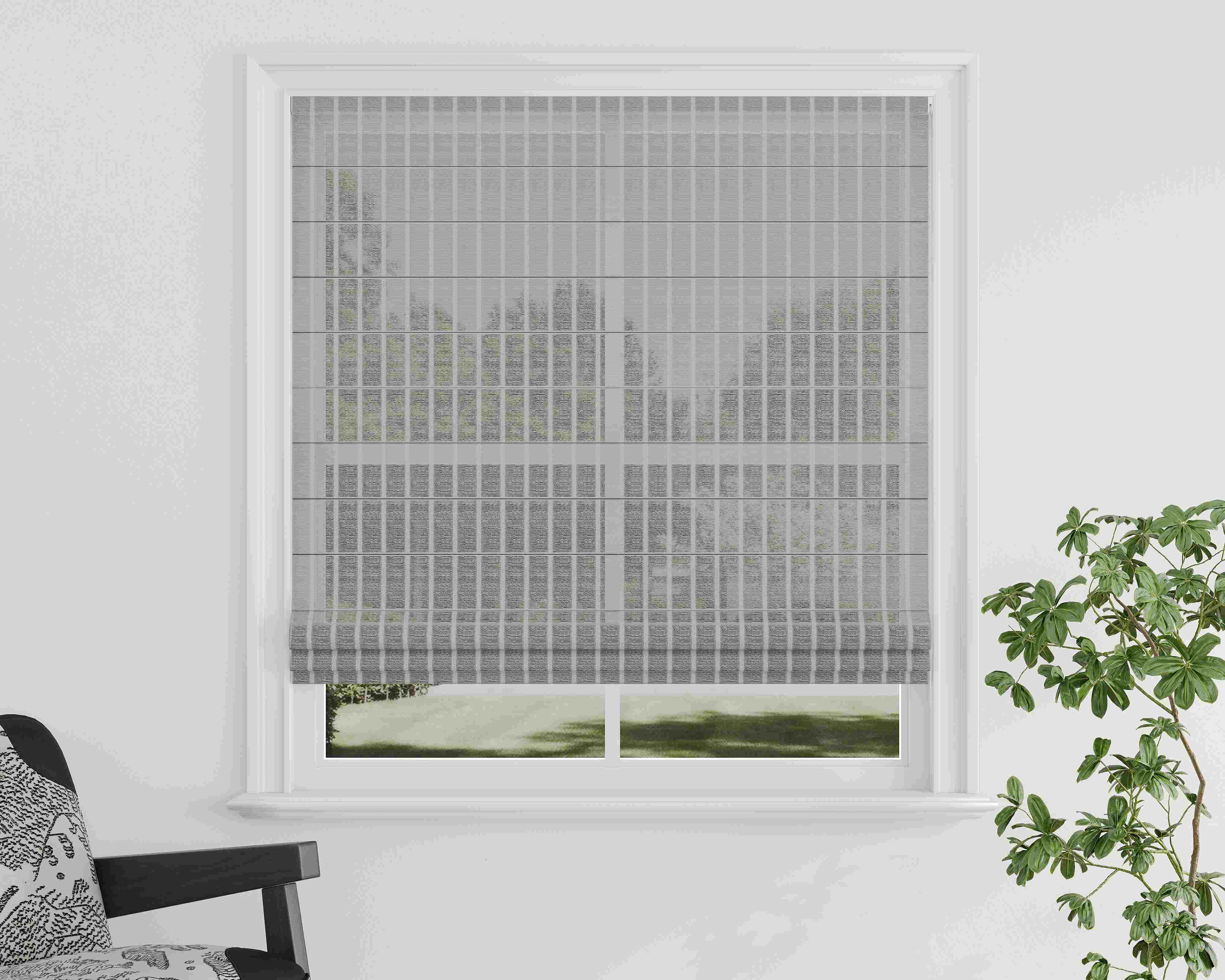 Close-up of textured light beige roller blind fabric sample.