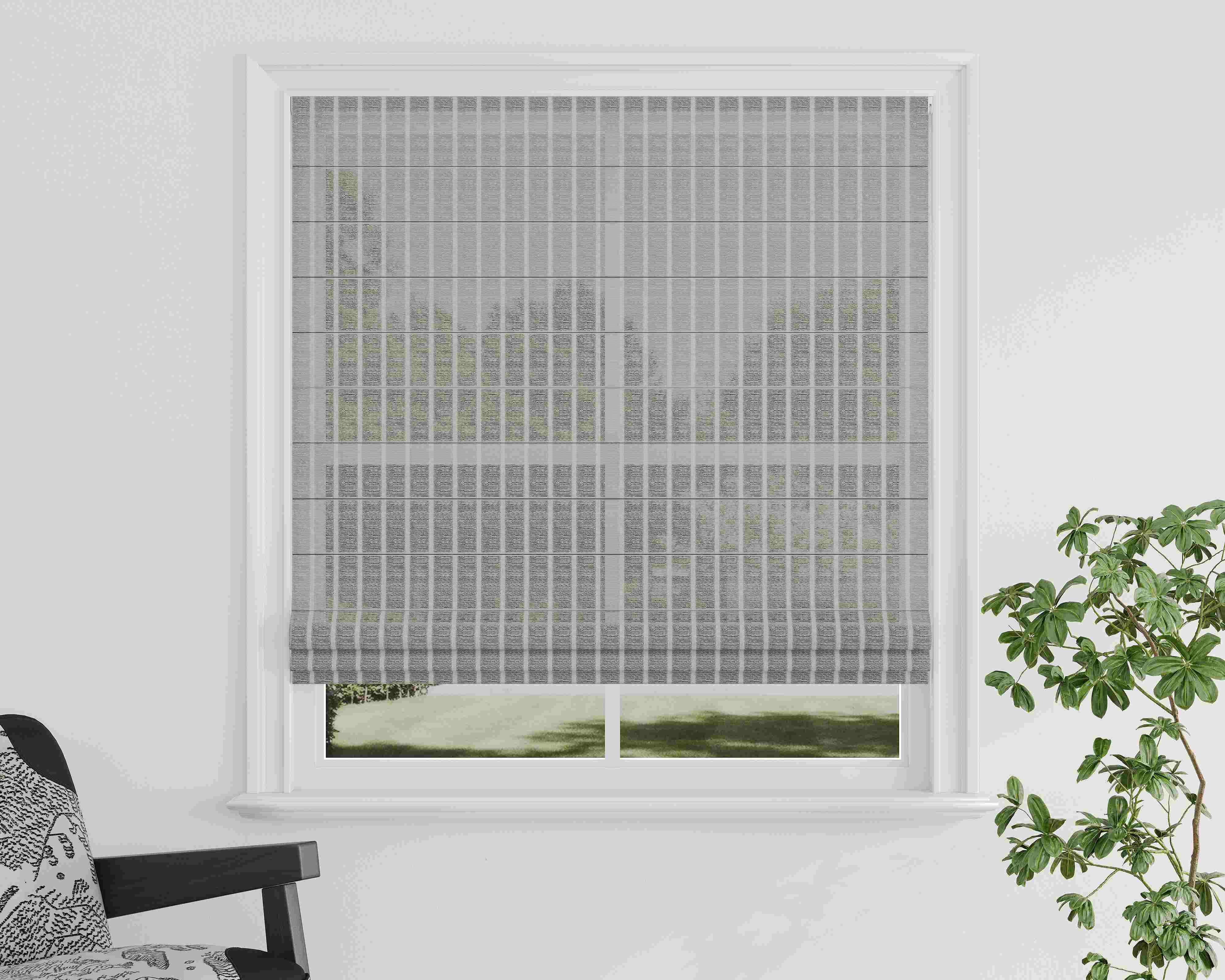 Close-up of layered window blinds with alternating sheer and opaque fabric