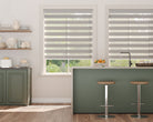 Light-filtering zebra blinds in a bright kitchen.