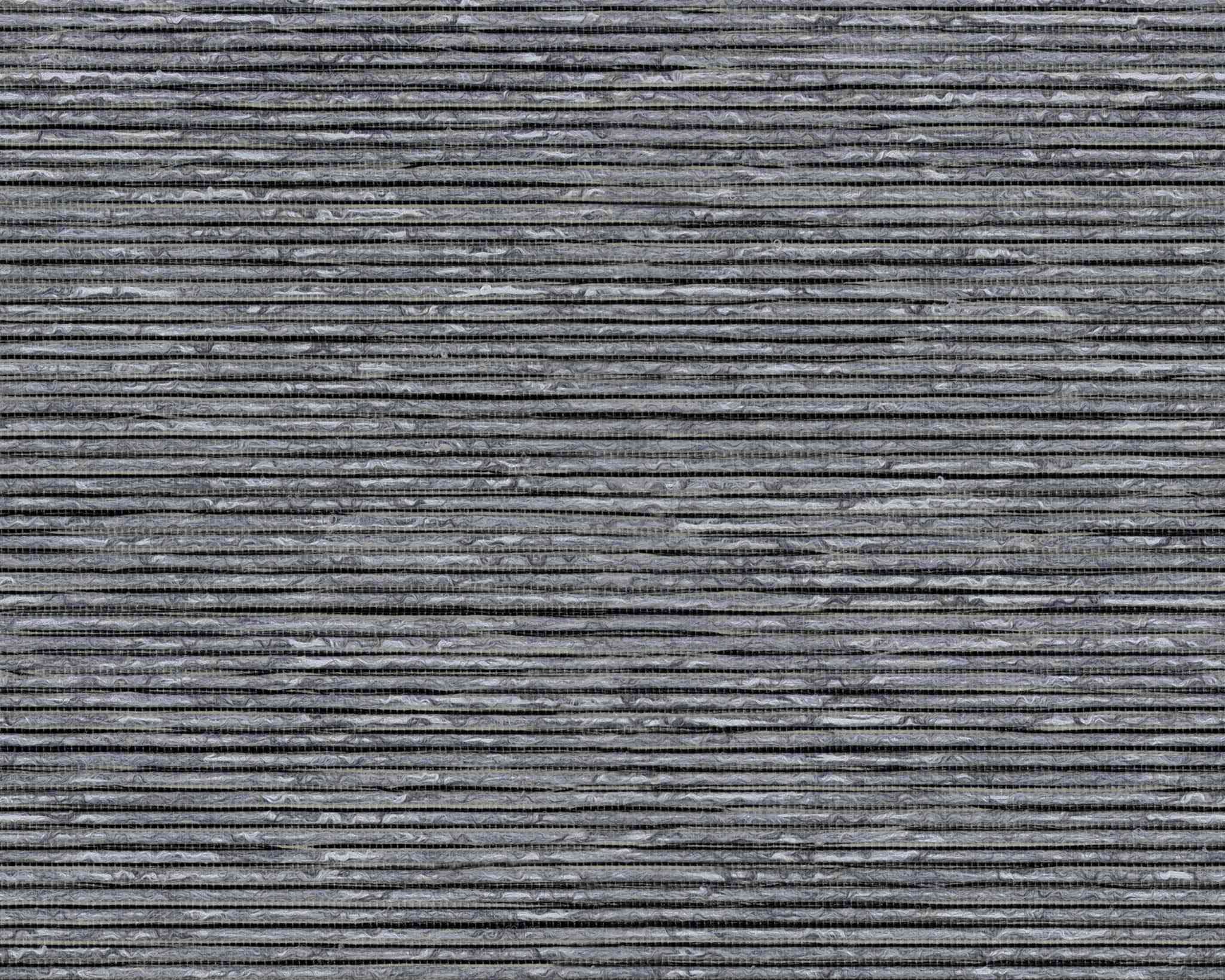 Full-length blackout blinds in a minimalistic bedroom setting