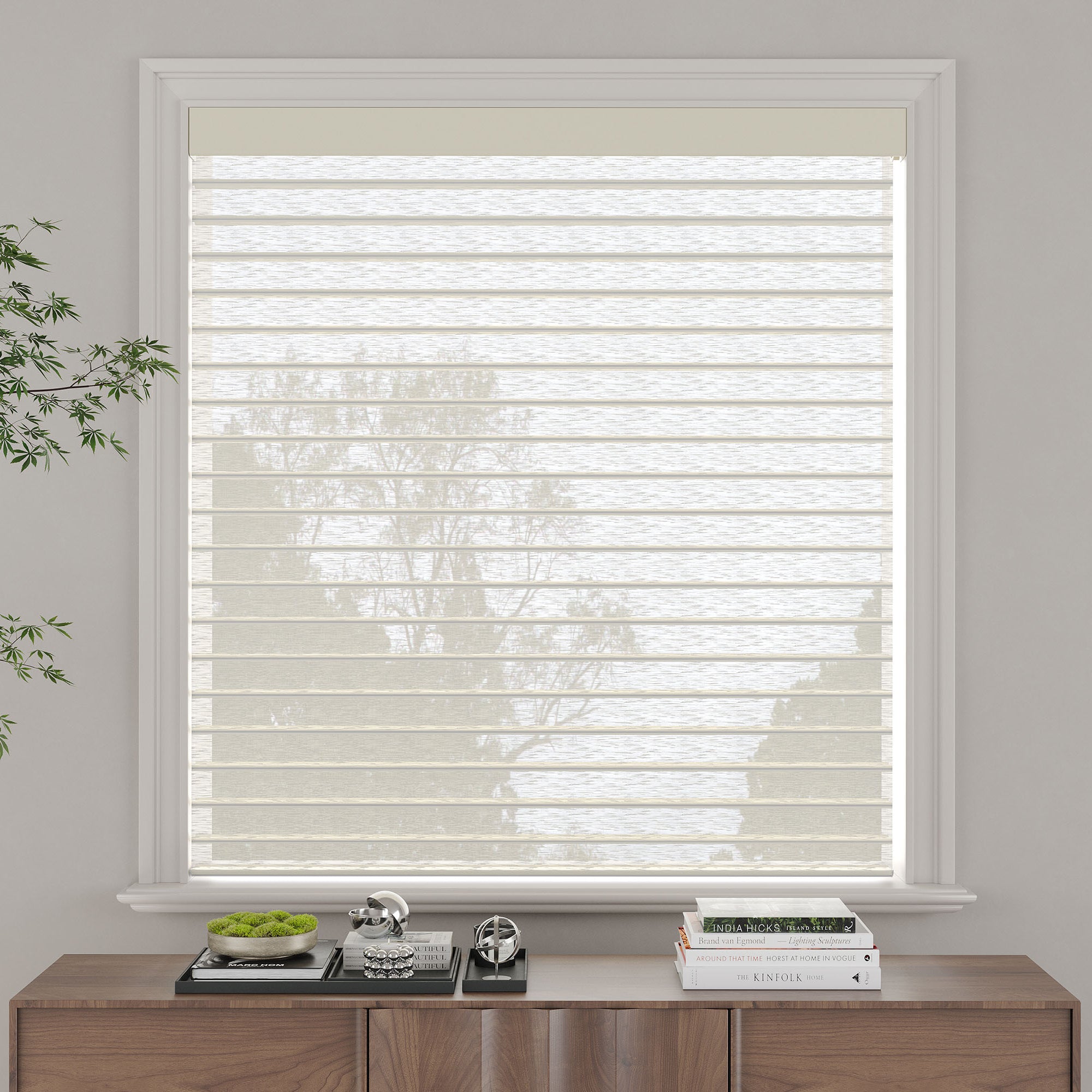 Light beige roller blind shown rolled down on a window.