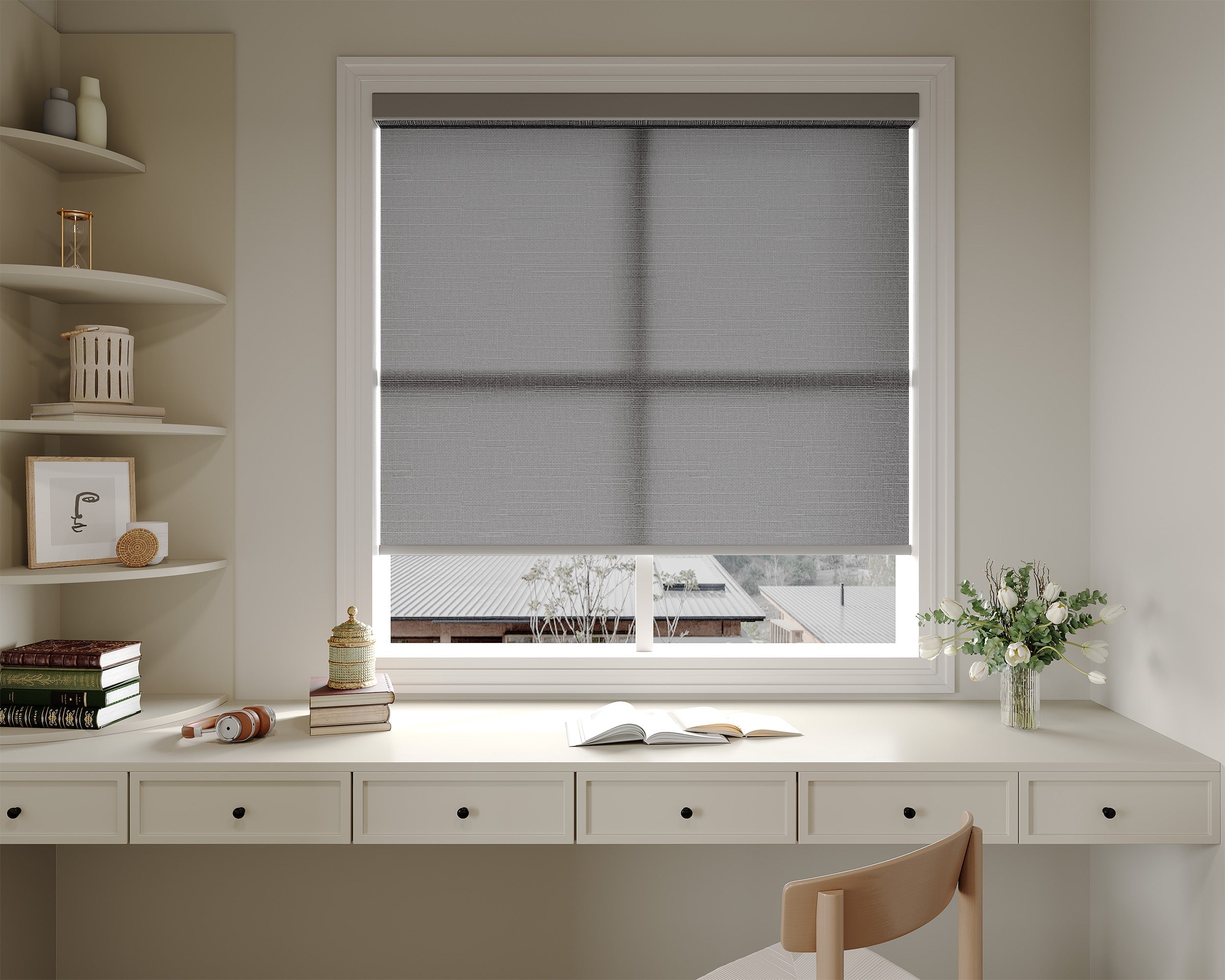Wide roller shade above a home office desk
